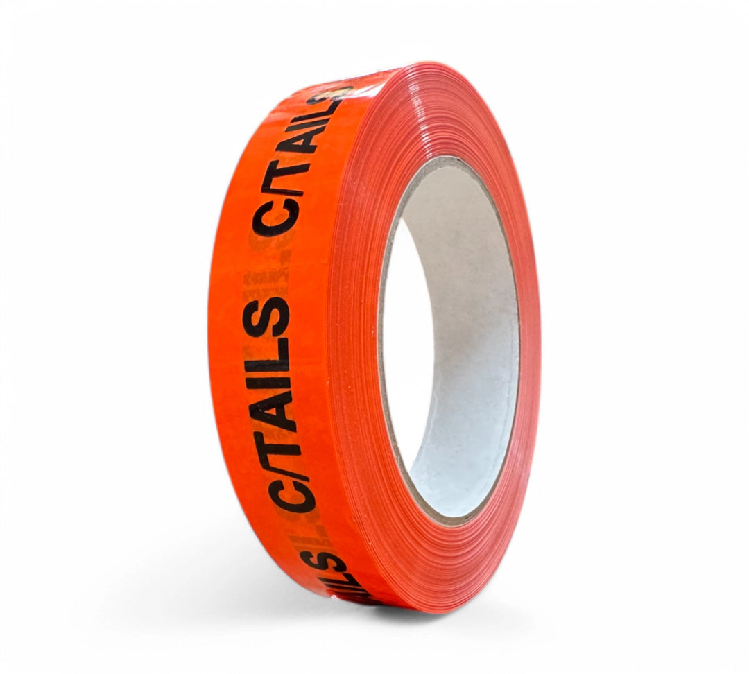 C/TAILS Rip A Sticker 24mm x 50mm black on fluro orange displayed for standout labelling on urgent or special freight