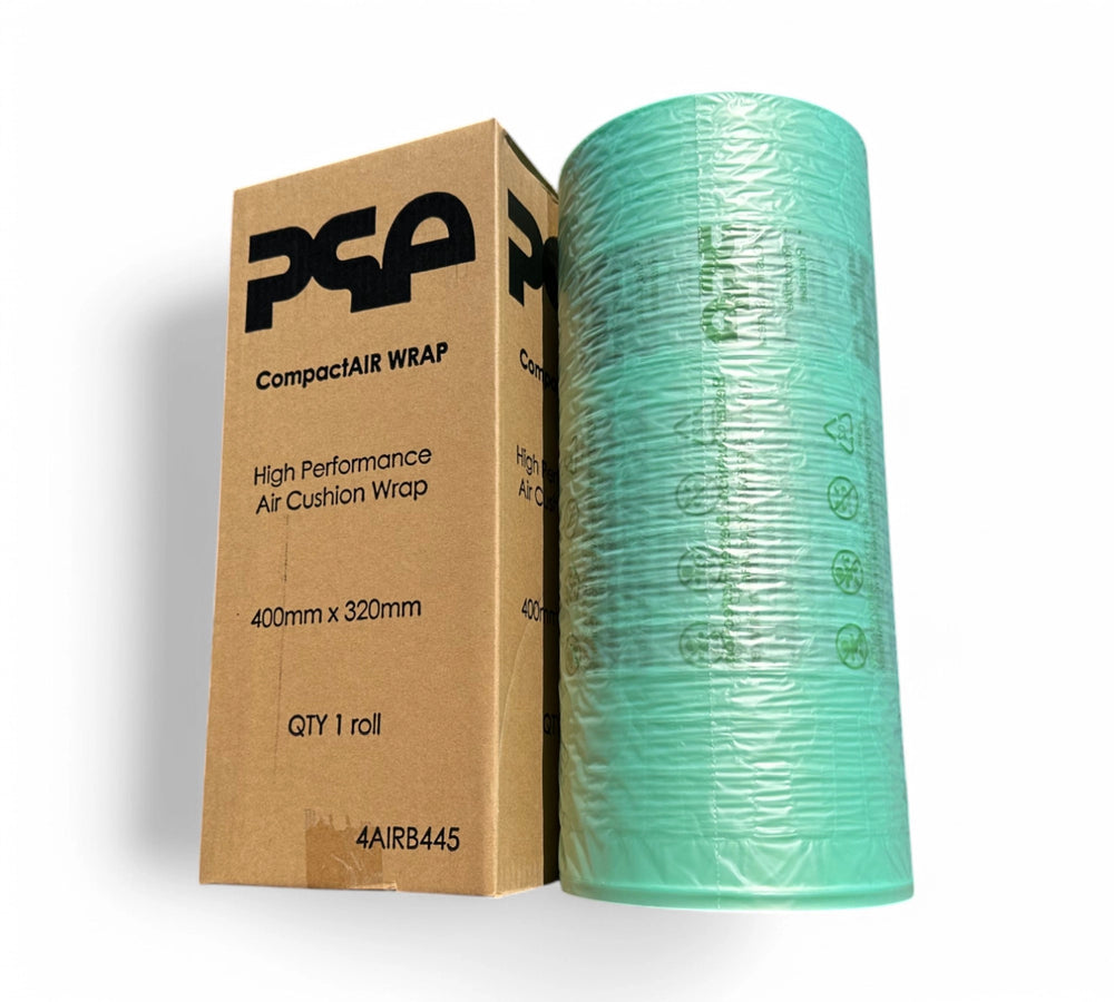 CompactAIR WRAP 400mm x 320mm x 450m roll in green film, not inflated, standing upright next to labelled brown carton with PSA branding